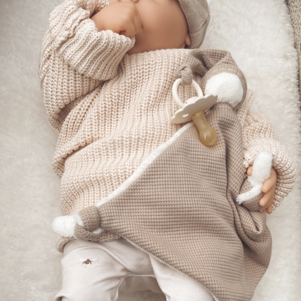 Gebreide trui baby gebroken wit